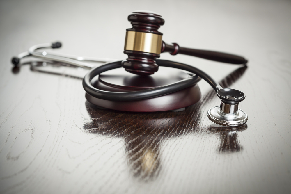 Judge's gavel and stethoscope