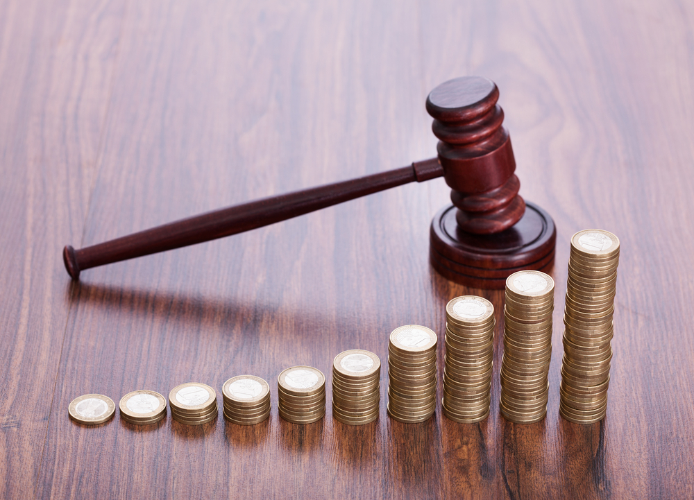 Coin stacks in front of gavel